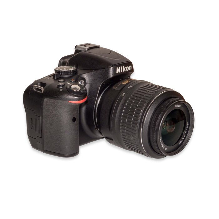 Nikon D5100 + AF-S 18-55mm VR