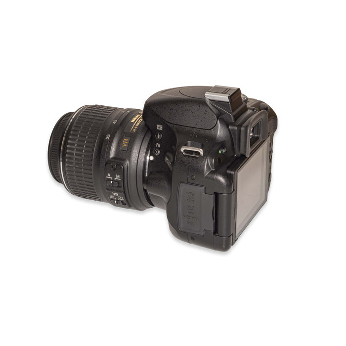 Nikon D5100 + AF-S 18-55mm VR